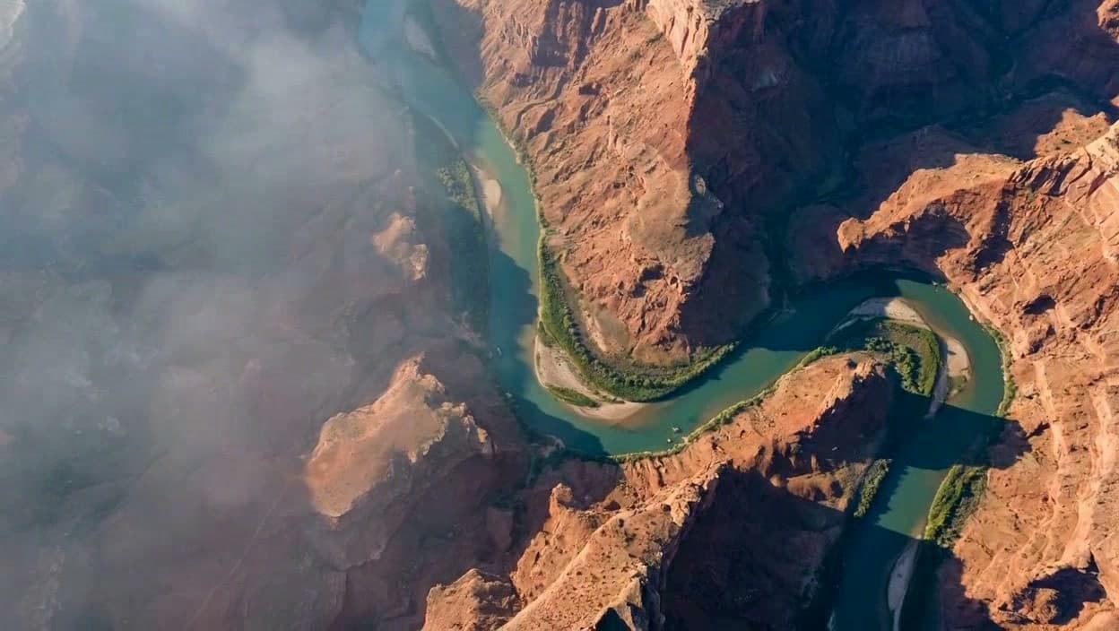 Top-down aerial terrain used to frame a direct reference to U.S. drone rules