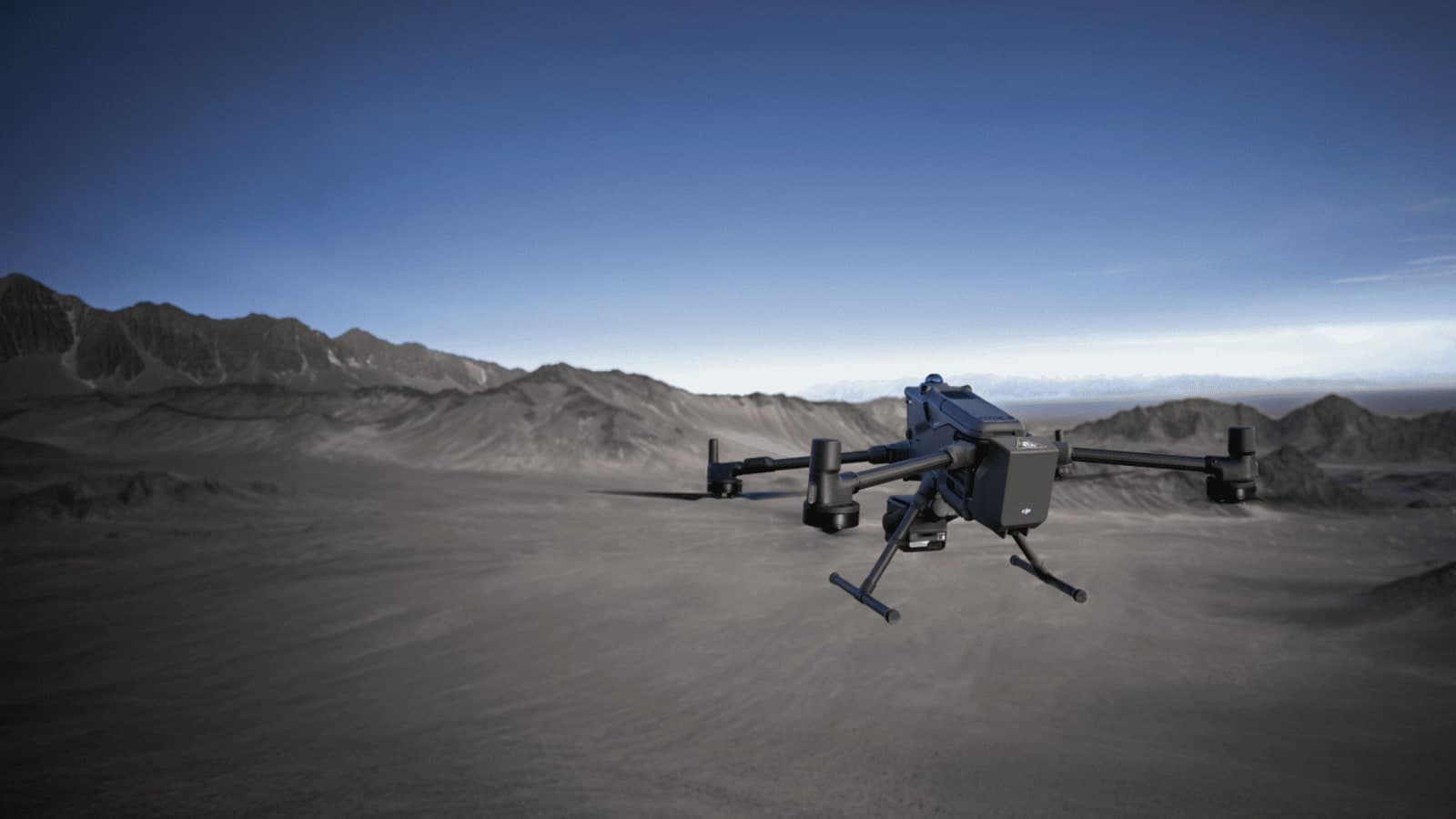 DJI Matrice 400 enterprise drone carrying the AP100 parachute system above a mountainous landscape